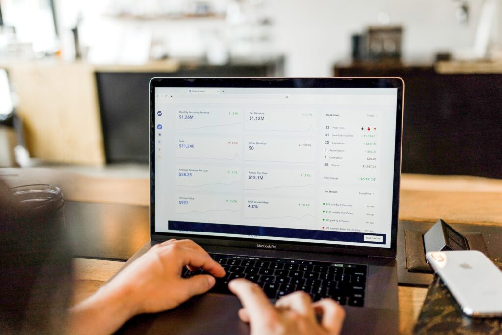 man typing on a computer